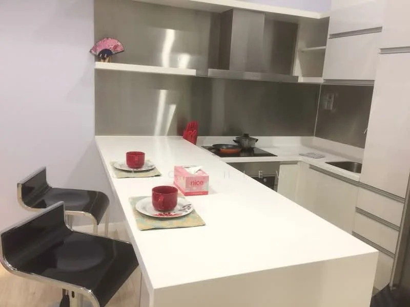 Kitchen features: white countertop, stainless-steel backsplash, built-in stove, stainless-steel sink, modern cabinetry, bar seating with two black stools, red kitchen accessories, decorative fan on wall; style: modern.