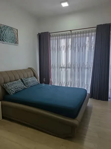 Bedroom features: king-size bed with upholstered headboard, blue bedding, two decorative pillows, floor-to-ceiling windows, sheer curtains, blackout curtains, wooden flooring, framed artwork on wall, recessed ceiling light; style: modern.