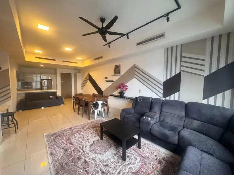 Living features: 5-blade ceiling fan with light, L-shape sectional sofa in dark grey, coffee table, area rug with geometric pattern, dining table with 6 chairs, wall-mounted TV, decorative wall with geometric patterns, tile flooring, recessed downlights; style: modern. Room features: open layout, kitchen area visible in background.