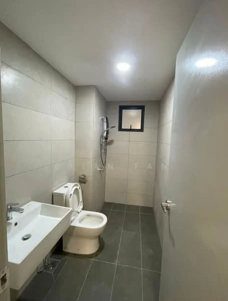 Bathroom features: wall-mounted toilet, sink with chrome faucet, shower with wall-mounted showerhead, grey ceramic wall tiles, dark grey floor tiles, small window for natural light, recessed ceiling lights; style: modern.