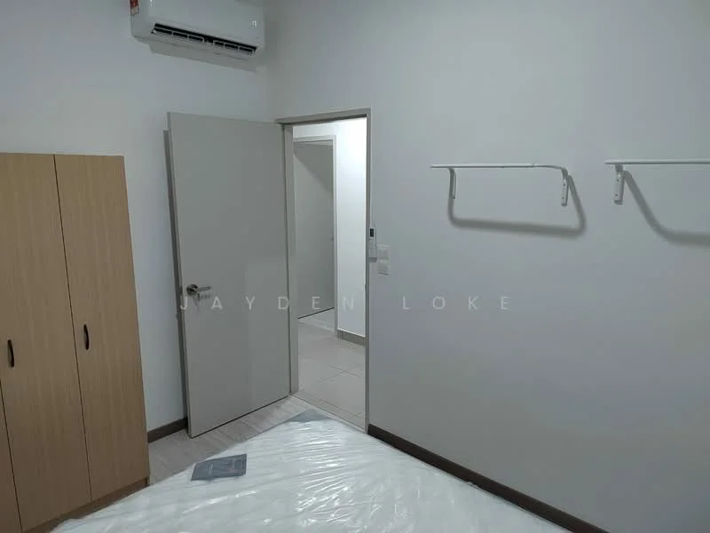 Room features: white painted walls, tile flooring, 1 wall-mounted split AC, built-in wardrobe, door leading to another room, shelves mounted on the wall, bed with mattress.