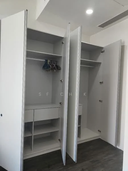 Room features: built-in wardrobe, white cabinetry, hanging space with hangers, shelves, drawer unit, laminate flooring, neutral wall color, recessed lighting; style: modern.