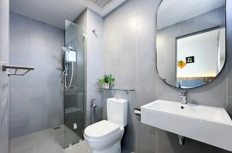 Bathroom features: grey tiled walls, grey tiled flooring, walk-in shower with glass enclosure, rain shower head, handheld shower, wall-mounted toilet, single-sink vanity with wall-mounted faucet, round mirror, glass shelf, towel rack, shower control panel; style: modern.