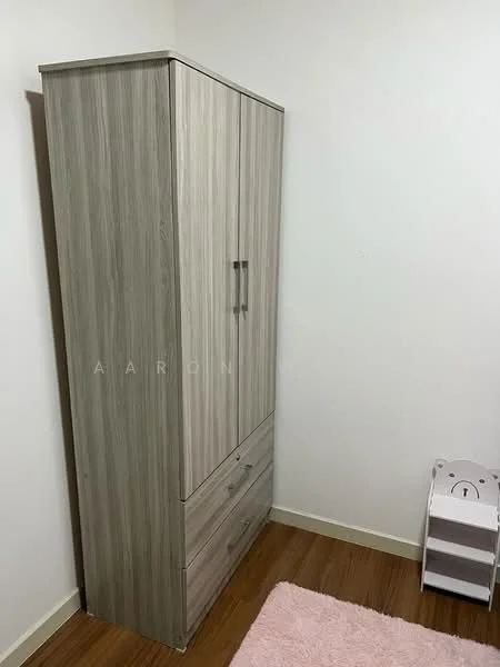 Room features: wooden flooring, light grey wardrobe with two doors and drawers, pink area rug, white storage unit, plain white walls; style: modern.