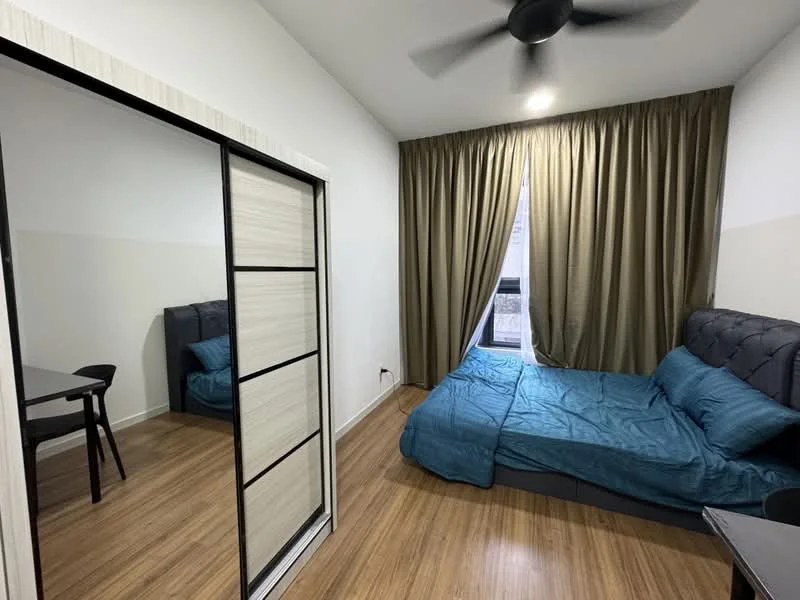 Bedroom features: queen-size bed with blue bedding, upholstered headboard, wooden flooring, floor-to-ceiling window with sheer curtains, black ceiling fan, built-in wardrobe with sliding doors, study desk, dining table for two; style: modern.