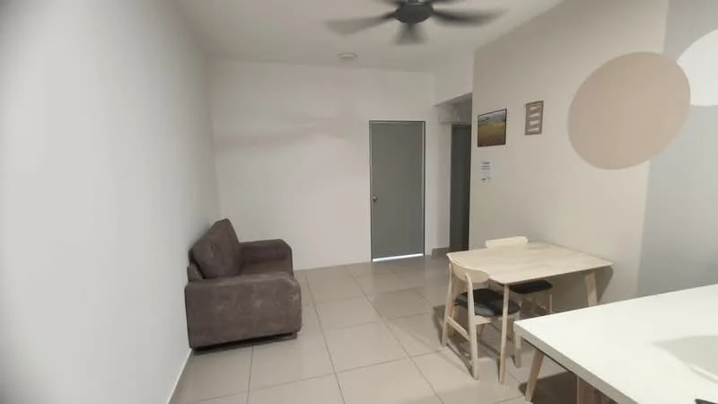Living features: grey fabric sofa, light-colored dining table, two dining chairs, cream tiled flooring, white painted walls, ceiling fan, doorway leading to another room, decorative wall art, natural light from doorway; style: modern.