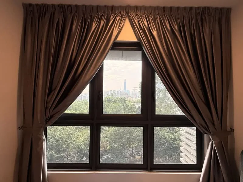 Room features: floor-to-ceiling windows, brown curtains, city view, greenery outside; view: city.