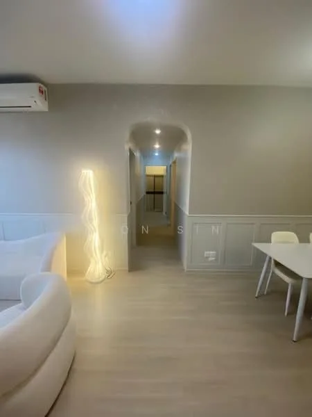 Living features: white painted walls, light wood flooring, recessed downlights, 1 wall-mounted split AC, curved white sofa, floor lamp with wavy design, dining table with white chairs, arched hallway leading to other rooms; style: modern.