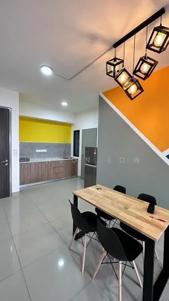 Kitchen features: grey painted walls, yellow accent wall, white ceiling, recessed downlights, pendant lighting with geometric design, ceramic tile flooring, wooden dining table, black dining chairs, stainless-steel fridge, kitchen cabinetry with wood finish, countertop with grey surface, sink, open layout; style: modern.
