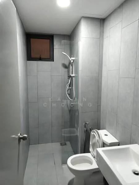 Bathroom features: grey tiled walls, grey tiled flooring, walk-in shower with glass enclosure, chrome handheld shower, chrome wall-mounted faucet, single-sink vanity, white sink, one-piece toilet, toilet bidet spray, small window, recessed lighting; style: modern.