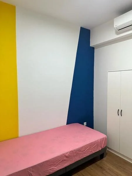 Bedroom features: single bed with pink bedspread, white walls with yellow and blue accent walls, wooden flooring, wall-mounted split AC, built-in wardrobe with white doors; style: modern.