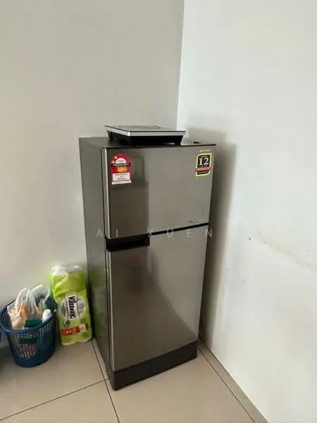 Room features: stainless-steel fridge, grey finish, top freezer, single-door, visible storage basket, clean tiled flooring, white painted walls; style: modern.