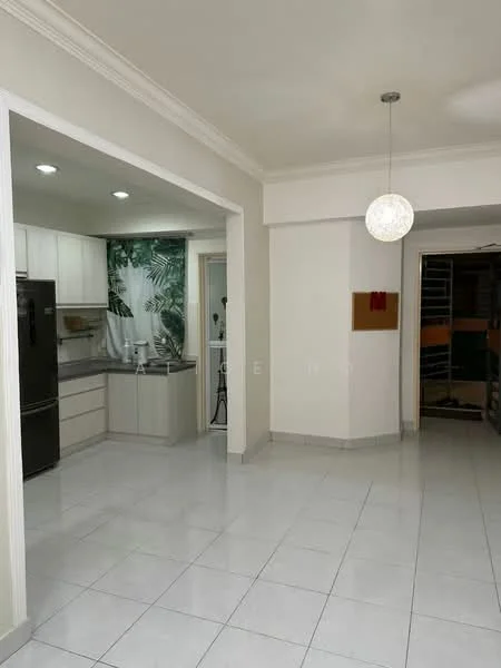 Kitchen features: white cabinetry, stainless-steel fridge, built-in oven, 4-burner gas hob, single-bowl stainless-steel sink, chrome pull-down faucet, white tiled backsplash, marble countertop, recessed downlights, tile flooring, green tropical-patterned curtain; style: modern. Living features: white painted walls, pendant light fixture, tile flooring, open layout, crown moulding; style: modern.