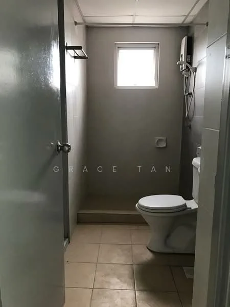 Bathroom features: white tiled walls, cream tiled flooring, one-piece toilet, shower area with glass partition, window for natural light, wall-mounted shower head, water heater, towel rack, door with handle.