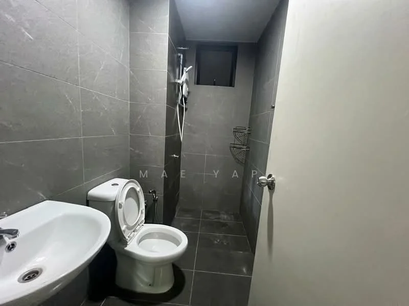 Bathroom features: grey tile flooring, grey tile walls, single-sink vanity with white cabinet, chrome basin mixer faucet, one-piece toilet, shower area with glass partition, wall-mounted shower head, towel rack; style: modern.