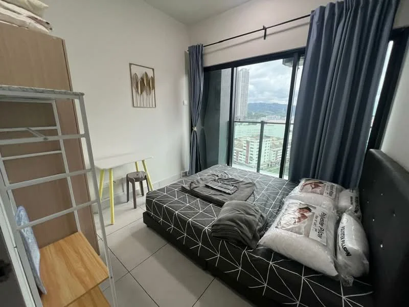 Bedroom features: queen-size bed with black upholstered headboard, bedding with decorative pillows, grey bedspread, floor-to-ceiling windows, city view, curtains in dark blue, light grey walls, tile flooring, small white desk with yellow legs, metal shelving unit, wooden bedside table; style: modern; view: city.