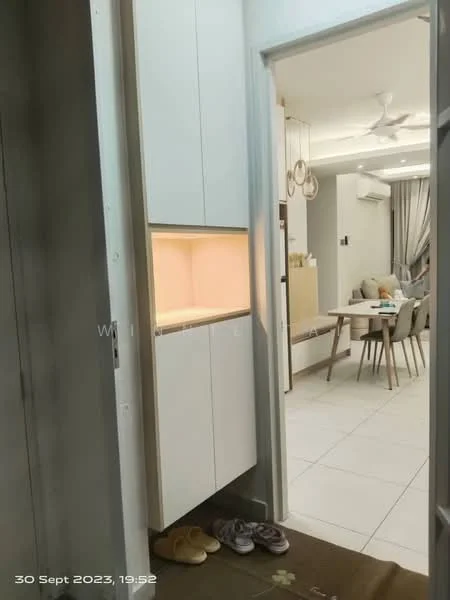 Room features: white cabinetry, built-in storage, soft lighting, tile flooring, ceiling fan, dining area visible in background, neutral wall color, open layout; style: modern.
