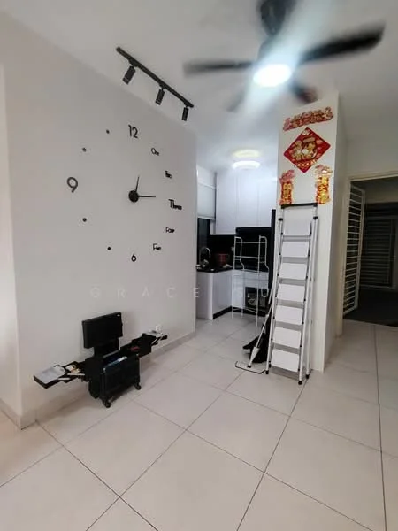 Room features: large wall clock, white painted walls, recessed ceiling lights, ceiling fan, tile flooring, open shelving, ladder, kitchen area visible in background; style: modern.