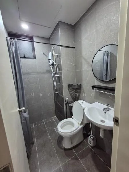 Bathroom features: grey tiled walls, grey tiled flooring, round mirror, single-sink vanity with white cabinet, chrome basin mixer faucet, one-piece toilet, shower with handheld showerhead, shower curtain, wall-mounted towel rack, window with frosted glass; style: modern.