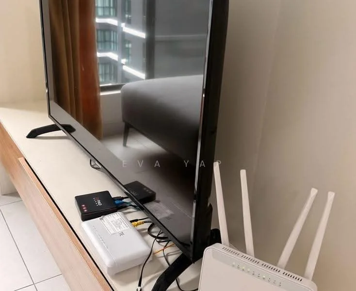 Living features: flat-screen TV, TV console, cable box, router, white walls, large window, curtains, light-colored flooring.