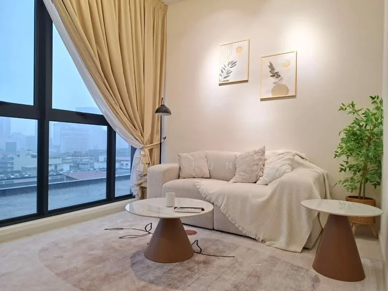 Living features: floor-to-ceiling windows, curtains in beige, light grey fabric sofa, decorative throw blanket, two round coffee tables with conical bases, area rug with soft texture, framed artwork on walls, potted plant, lamp with adjustable arm; style: modern; view: city.