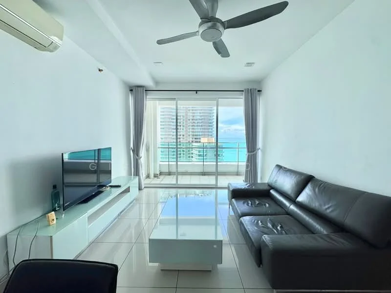Living features: 3-seater leather sofa in dark grey, glass coffee table, wall-mounted TV, TV console in white, floor-to-ceiling windows, sliding glass door, curtains in light grey, white painted walls, polished tile flooring, 5-blade ceiling fan with light, air conditioning unit on wall; style: modern; view: sea.