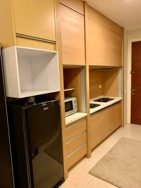 Kitchen features: black fridge, built-in microwave, 4-burner gas hob, wood cabinetry, white countertop, open shelving, tile flooring, neutral wall colour, area rug; style: modern.