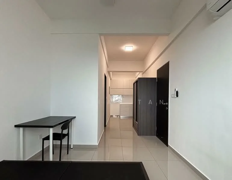 Room features: white painted walls, tile flooring, ceiling light fixture, wall-mounted split AC, black door, black cabinetry, kitchen area visible in background, dining table with black legs, black chair, open layout; style: modern.