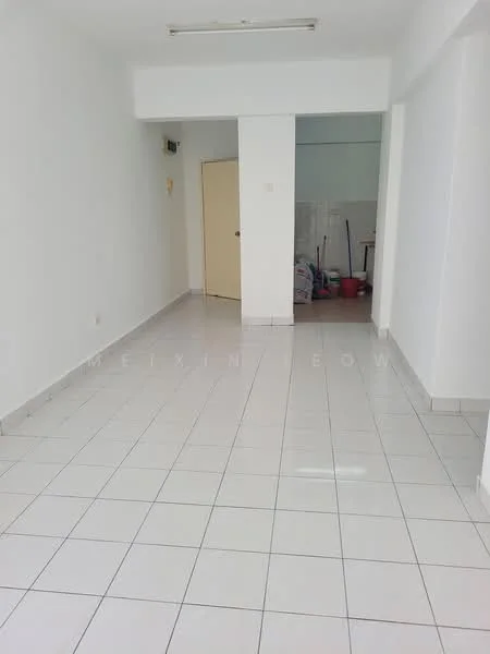 Room features: white painted walls, glossy white floor tiles, ceiling lights, door leading to another room, clean and uncluttered space, no visible furniture, neutral color scheme, open layout; style: minimalist.