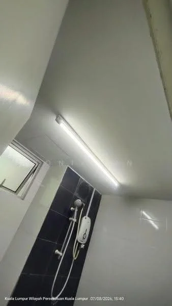 Bathroom features: white painted walls, ceramic tile flooring, shower with glass enclosure, wall-mounted shower head, built-in shower mixer, exposed plumbing, LED ceiling light, small window for ventilation; style: modern.