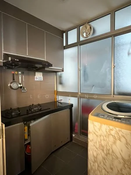 Kitchen features: black granite countertop, stainless-steel cabinetry, 2-burner gas hob, built-in range hood, washing machine, grey tiled flooring, glass window with frosted panels, wall-mounted clock; style: modern.