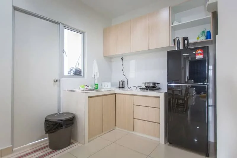 Kitchen features: light wood cabinetry, white countertop, black refrigerator, stainless-steel stove, kettle, sink, window, door, tile flooring, trash bin, dish drying rack; style: modern.