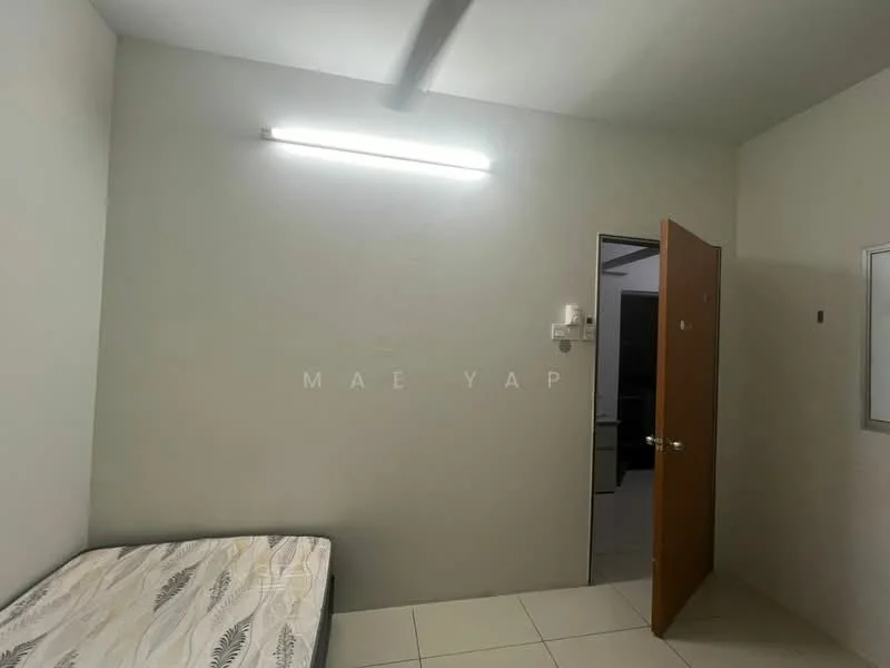 Room features: white painted walls, tile flooring, single bed mattress, door with handle, light fixture on ceiling, window with no treatment, power outlet, wall-mounted air conditioning unit.