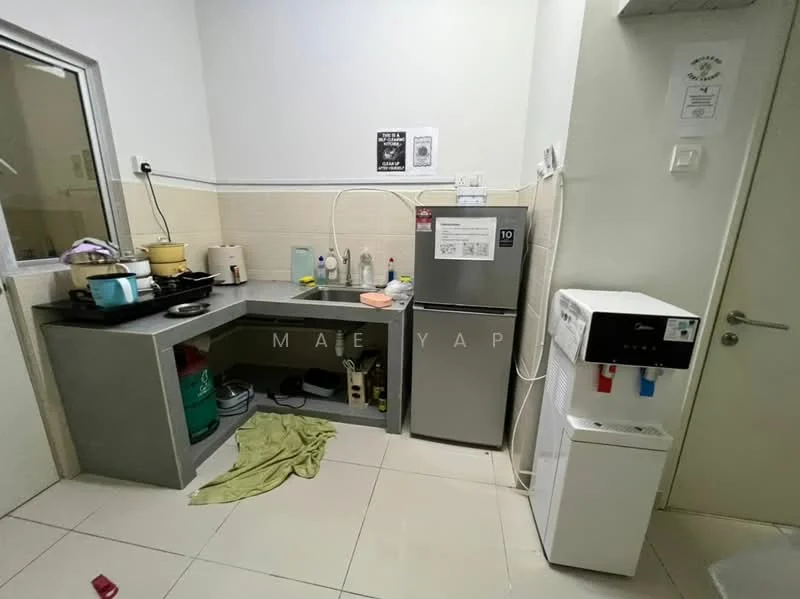 Kitchen features: grey laminate countertop, stainless-steel fridge, white water dispenser, built-in kitchen cabinet, gas stove with 2 burners, sink with faucet, tile backsplash, white tiled walls, cream tiled flooring, kitchen utensils and containers, cleaning supplies, green cloth on countertop; style: modern.