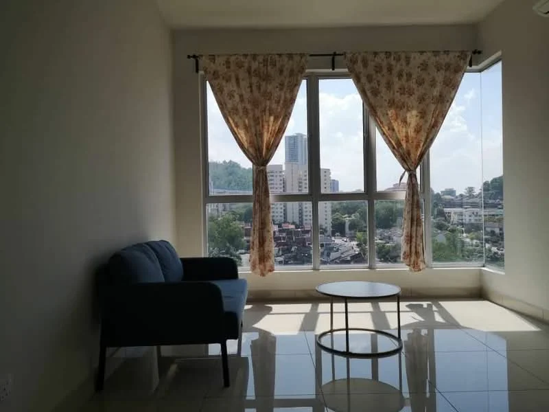 Living features: floor-to-ceiling windows, curtains with floral pattern, 3-seater fabric sofa in blue, round coffee table, glossy tile flooring, neutral painted walls, city view, natural light from windows; style: modern; view: city.