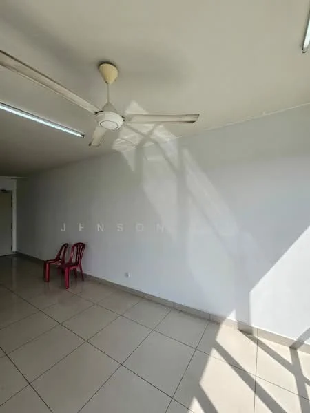 Room features: white painted walls, tile flooring, ceiling fan, natural light from windows, two red plastic chairs, fluorescent ceiling lights.