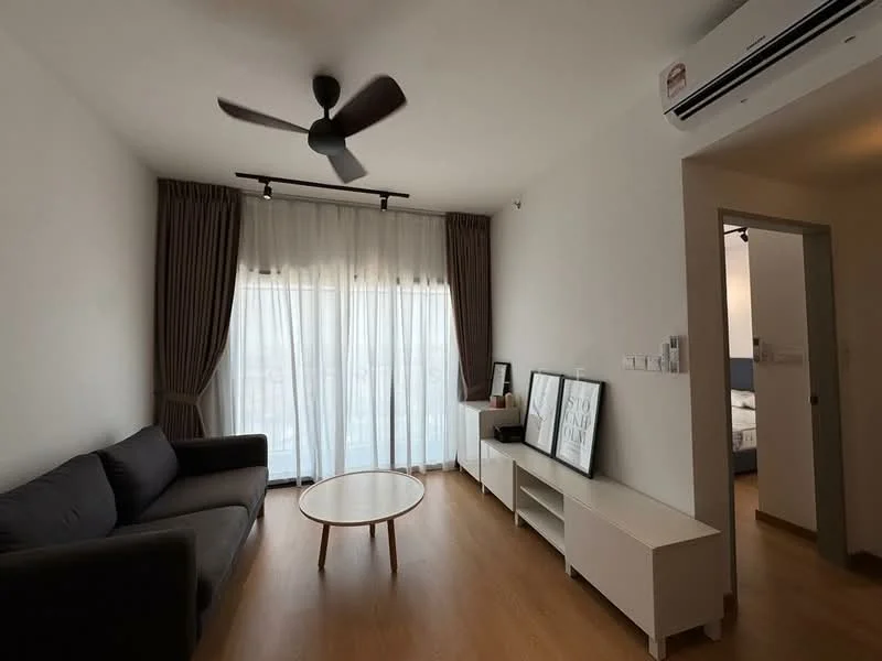 Living features: 3-seater fabric sofa in grey, round coffee table, floor-to-ceiling windows, sheer curtains, dark brown curtains, wall-mounted split AC, light wood flooring, decorative wall art, white TV console; style: modern.