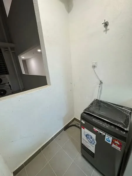 Laundry features: top-load washing machine, grey appliance, white painted walls, grey tile flooring, plumbing connection, electrical outlet, window opening, minimal decor.