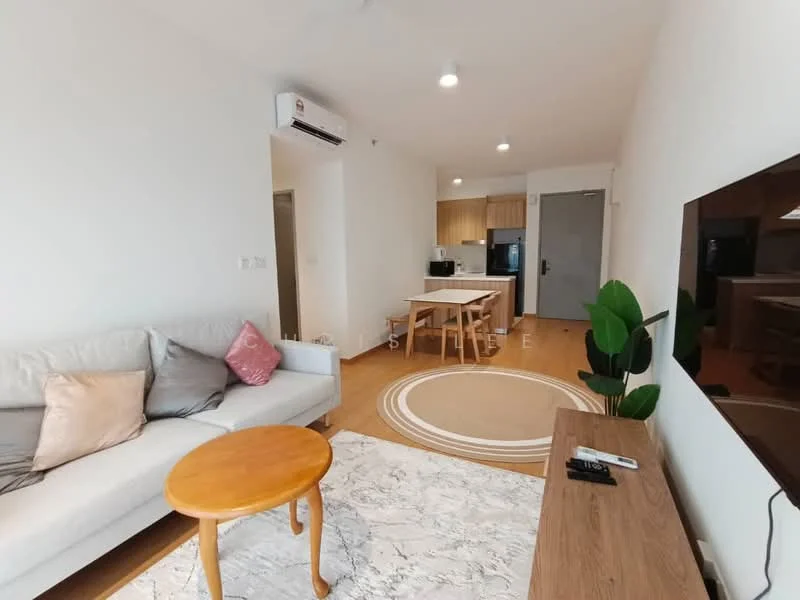 Living features: light grey fabric sofa, wooden coffee table, area rug with geometric pattern, wall-mounted TV, TV console, recessed downlights, 1 wall-mounted split AC, wooden flooring, potted plant, open-plan layout with kitchen, neutral painted walls; style: modern. Kitchen features: kitchen island with seating, stainless-steel fridge, built-in oven, microwave, wood cabinetry, light wood countertops, ceramic tile backsplash; style: modern.