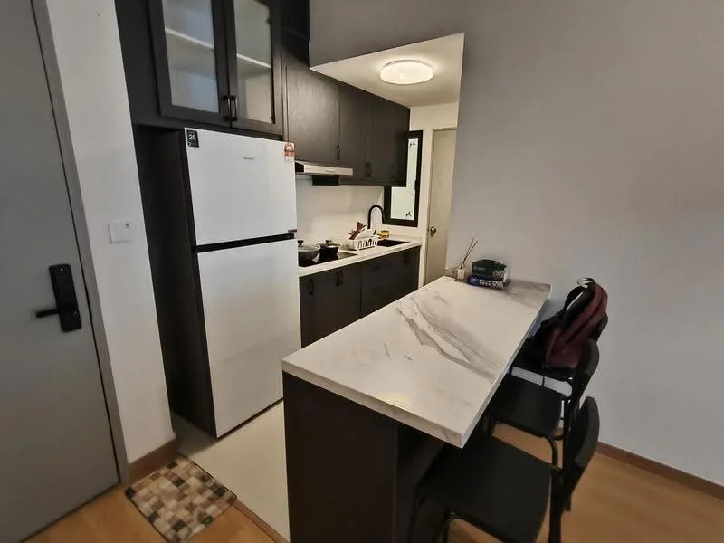 Kitchen features: white refrigerator, black cabinetry, marble countertop, single-bowl stainless-steel sink, chrome pull-down faucet, built-in stove, wall-mounted mirror, open shelving, bar seating with two black chairs, tile backsplash, wooden flooring, recessed ceiling light; style: modern.