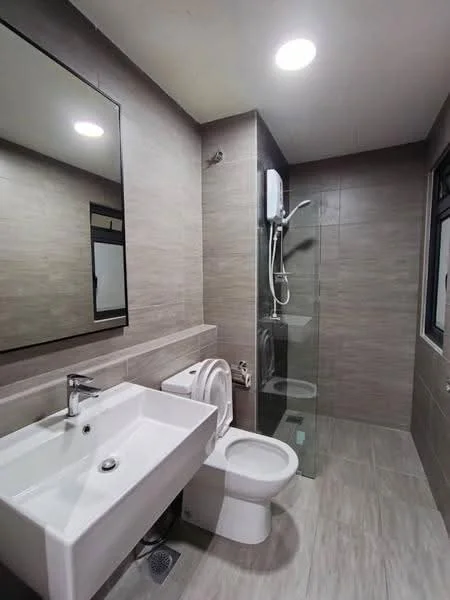Bathroom features: single-sink vanity with white cabinet, chrome basin mixer faucet, framed mirror, one-piece toilet, walk-in shower with glass enclosure, rain shower head, grey tile flooring, grey tile wall cladding, recessed LED downlights, window with black frame; style: modern.