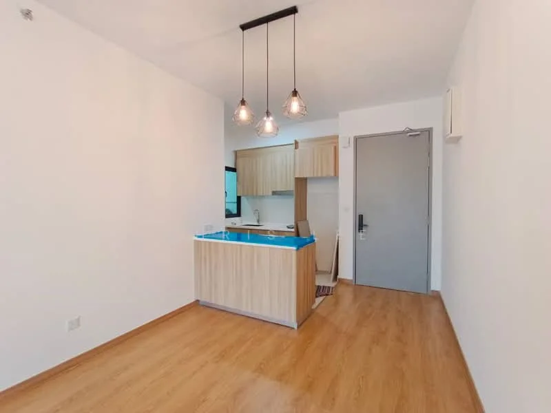 Kitchen features: light wood cabinetry, blue countertop, stainless-steel sink, chrome pull-down faucet, built-in stove, refrigerator, pendant lighting, laminate flooring, white painted walls, window with natural light, open layout, door leading to hallway; style: modern.