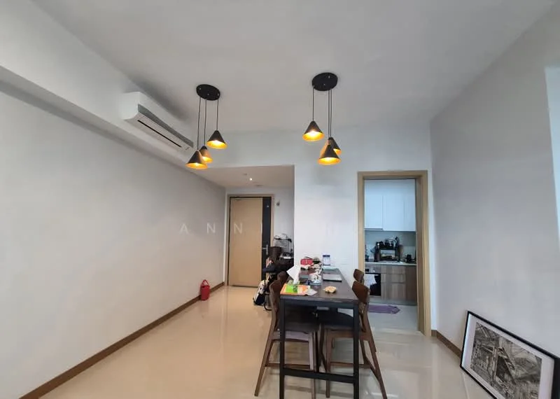 Dining features: dining table with four chairs, pendant lighting with three bulbs, cream painted walls, glossy tile flooring, wall-mounted split AC, door leading to kitchen, open layout, decorative wall art on floor; style: modern. Kitchen features: kitchen cabinetry, countertop, refrigerator visible, kitchen appliances visible; style: modern.