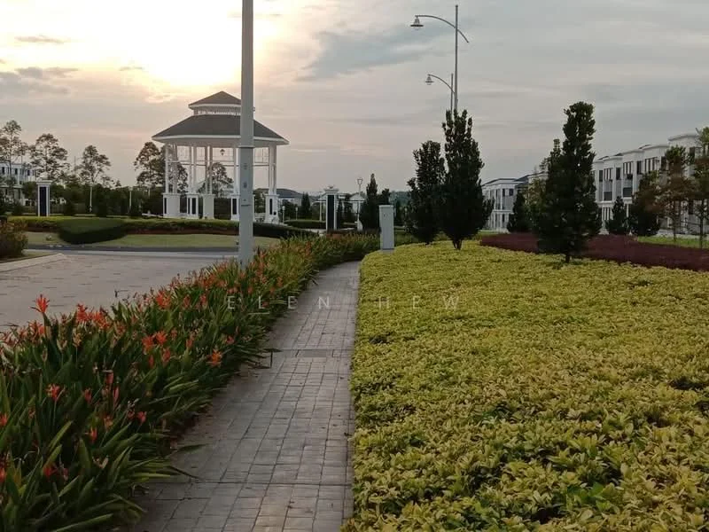 Exterior type: landscape garden; features: paved walkway, manicured lawn, flower beds with orange flowers, hedges, gazebo, street lamps, tropical landscaping, surrounding greenery; style: modern.