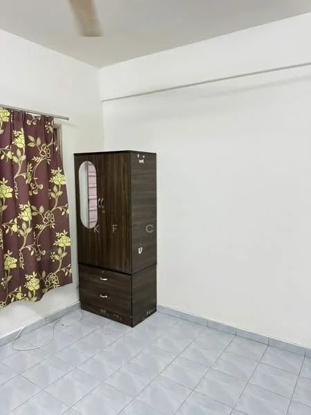 Room features: white painted walls, light grey tiled flooring, curtains with floral pattern in brown and yellow, dark wood wardrobe with drawers, mirror on wardrobe door.