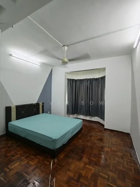 Bedroom features: parquet wood flooring, white painted walls, grey accent wall, ceiling fan, window with grey curtains, unmade bed with mattress, light fixtures on ceiling.