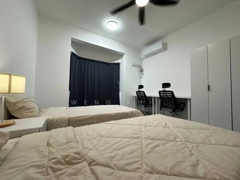 Bedroom features: two single beds with beige bedding, white painted walls, ceiling fan, 1 wall-mounted split AC, blackout curtains, study desk with two black office chairs, built-in wardrobe, laminate flooring, table lamp; style: modern.