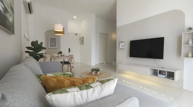 Living features: light grey fabric sofa, decorative cushions in green and orange, round coffee table with wooden top, wall-mounted flat-screen TV, TV console with storage, recessed lighting, white walls, cream tiled flooring, indoor plant in ceramic pot, pendant light fixture, dining area with wooden table and chairs in background; style: modern.