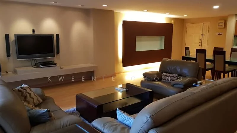 Living features: 3-seater leather sofa in beige, 2-seater leather sofa in grey, coffee table, wall-mounted TV, entertainment unit, wooden flooring, recessed downlights, decorative wall panel with backlighting, dining area visible in background, neutral painted walls; style: modern.