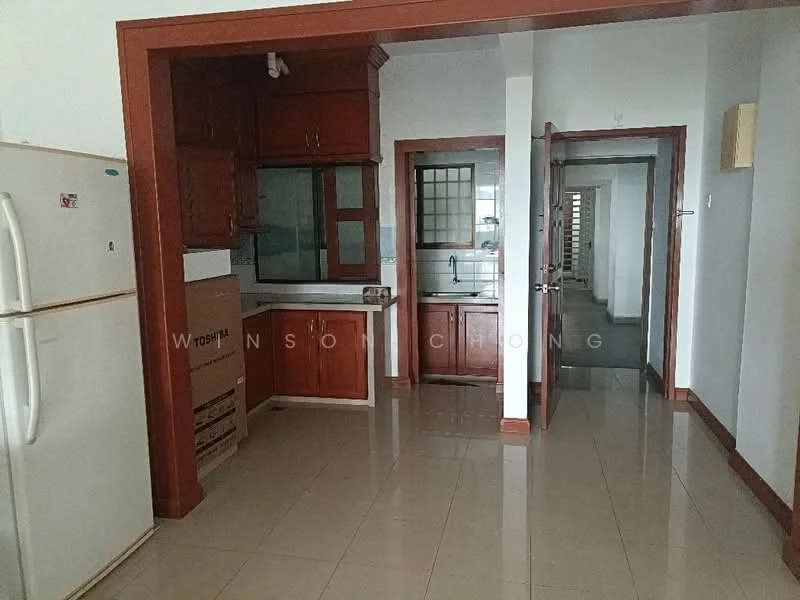 Kitchen features: white walls, cream tiled flooring, wood cabinetry, countertop, single-bowl stainless-steel sink, built-in kitchen cabinet, window above sink, refrigerator, open layout to living area. Living features: cream tiled flooring, white walls, doorway leading to hallway, open layout to kitchen. Hallway features: white walls, cream tiled flooring, doorway leading to other rooms.